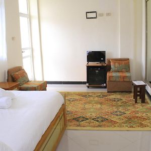 Kamer met een Queen Size Bed